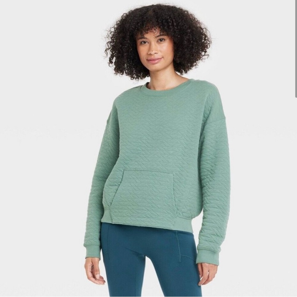 Soft green, cropped sweatshirt. Women’s medium. Like new condition!